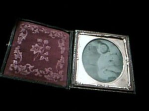 Metal plate photo in hinged frame